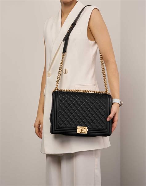 black chanel boy bag price|More.